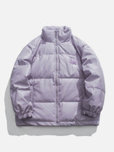 Einfarbige Lederjacke mit M-Patch-Stickerei